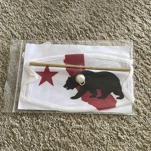 Mask with hole for drink